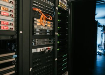 a rack of servers in a server room