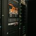a rack of servers in a server room